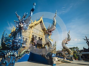 Blue god spirit Buddhist deity at Chiang Rai's Wat Rong Suea Ten (Blue Temple)