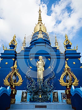 Blue god spirit Buddhist deity at Chiang Rai's Wat Rong Suea Ten (Blue Temple)