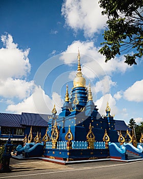 Blue god spirit Buddhist deity at Chiang Rai's Wat Rong Suea Ten (Blue Temple)