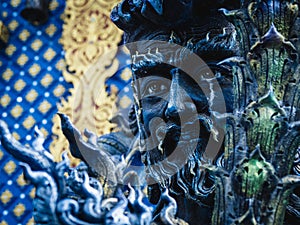 Blue god spirit Buddhist deity at Chiang Rai's Wat Rong Suea Ten (Blue Temple)