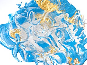 Blue and gold liquid texture. Hand drawn marbling background. Ink marble abstract pattern