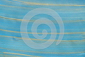 Blue and gold painted on paper background texture