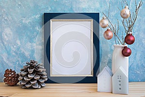 Blue Golden Frame Mock Up Christmas New Year Pine Cone Colorful Balls on Tree Branch House Candles Pastel Color Wall