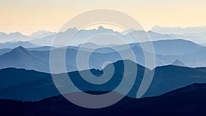 Blue gradient in the French Alps seen from the Mont Ventoux at sunrise