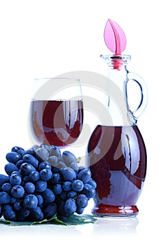 Blue grape cluster and red wine