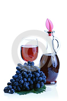 Blue grape cluster and red wine