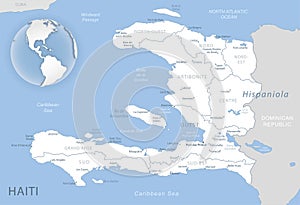 Blue-gray detailed map of Haiti administrative divisions and location on the globe.