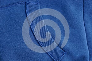 Blue gray fabric texture of the jacket with a pocket