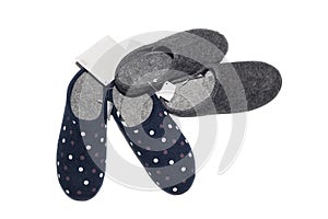 The blue and gray, female slippers on a white background