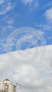 Blue gray light sky nature white clouds whether background , sun face