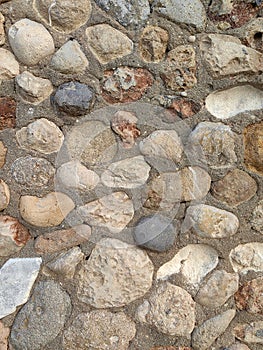 Blue and gray sea pebble-stone wall texture