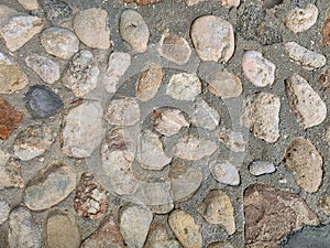 Blue and gray sea pebble-stone wall texture