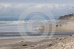 Blue gray skies along the beach and cliffs