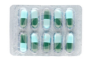 Blue green antibiotic pills gelatin capsule in blister pack