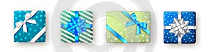 Blue, green gift box with ribbon and bow, top view