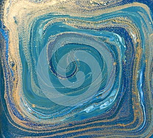 Blue, green and gold liquid texture. Hand drawn marbling background. Ink marble abstract pattern