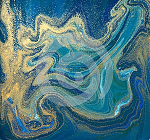 Blue, green and gold liquid texture. Hand drawn marbling background. Ink marble abstract pattern