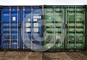 blue and green industrial shipping containers