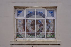 Blue and green lead stained window