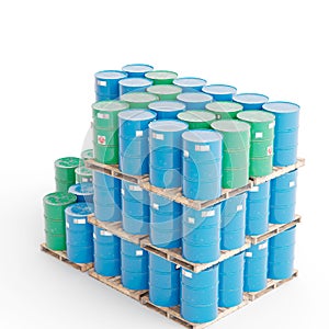 Blue and green metal barrels isolated on a white background