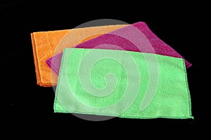 Blue, green, orange and pink microfiber cleaning cloths,