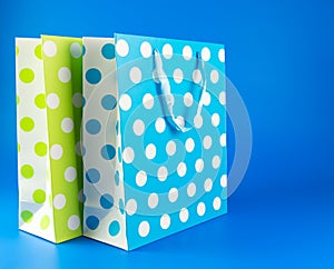 Blue and green polka dot gift bag