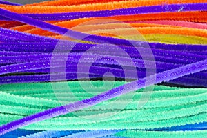 Blue,Green,Purple,Orange,Pink and Yellow pipe cleaners background