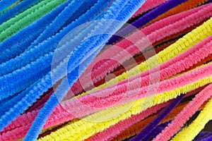 Blue,Green,Purple,Orange,Pink and Yellow pipe cleaners background