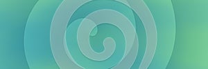 Blue and green spiral abstract banner background with smooth tonal transitions
