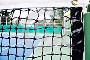 Blue and green tennis court surface,Tennis ball on the field