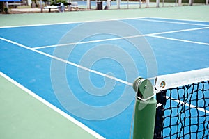 Blue and green tennis court surface,Tennis ball on the field