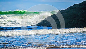 Waves crashing ashore, Bethels Beach, Auckland, New Zealand