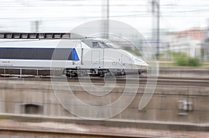 Blue and grey high-speed train