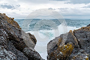 Blue and grey ocean waves crashing