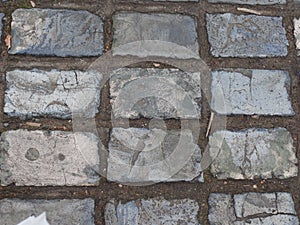 Blue-grey tiled pavement on a street in Rochester, Kent