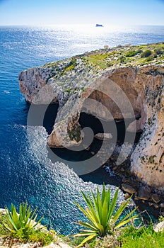 Blue grotto arch on Malta island and Filfla, Mediterranean sea