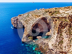 Blue Grotto in Malta island of birds. Aerial top view