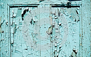 Blue grunge door with cracked paint