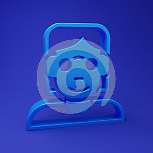 Blue Hacker or coder icon isolated on blue background. Programmer developer working on code, coding, testing, debugging