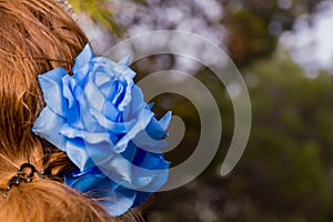 A Blue Hair Clip in the Shape of a Rose