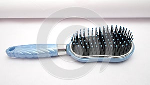 Blue hair comb