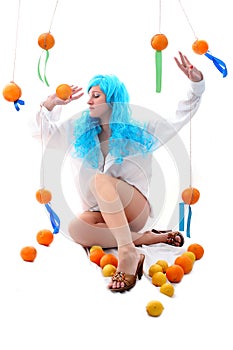 Blue hairs girl with oranges