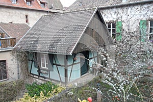 A blue half-timberedhouse in RibeauvillÃÂ© in France.