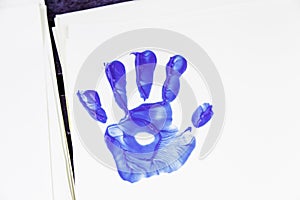 Blue hand footprint