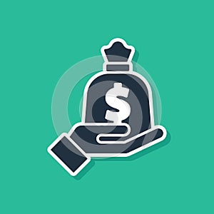 Blue Hand holding money bag icon isolated on green background. Dollar or USD symbol. Cash Banking currency sign. Vector