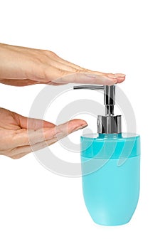 Blue hand sanitizer soap dispenser with arm isolated on white background