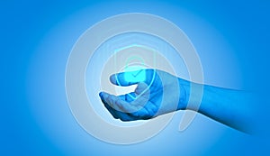 The blue hand is a sign of an Internet network security system, which protects corporate and financial transaction data from cyber