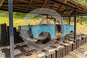 Blue handcar on small station Golubici of so called Sargan Eight narrow gauge railway, Serbia.