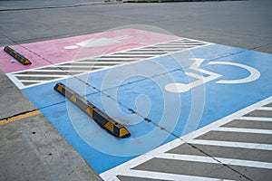 Blue Handicap at parking car sign outdoors for Disabled, Wheelchair or elder old or cannot selfhelp people