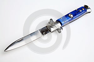 Switchblade knife on white background